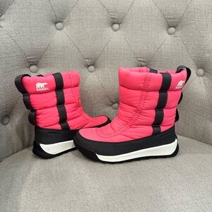 Girl’s pink Sorel snow boots